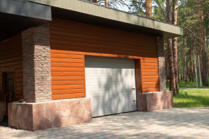 Read more about the article Why Your Garage Door Keeps Coming Off Track & How to Fix It Safely 
